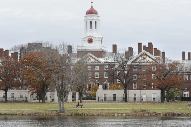 A tower with a red roof on the Charles River.