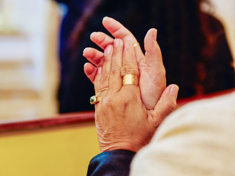 Hands pressed together