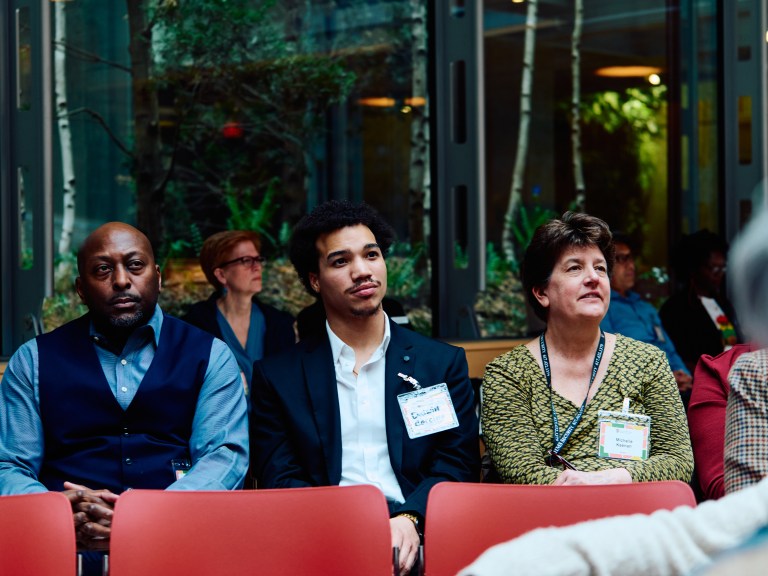 An audience looking forward