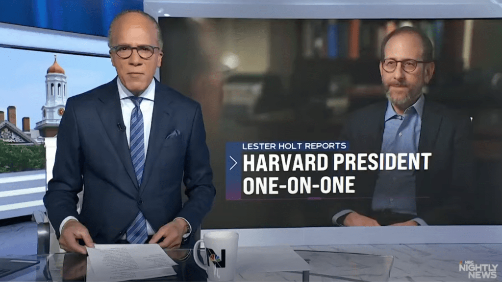 Screen capture of Lester Holt speaking directly to camera with a photo of President Garber in the background.