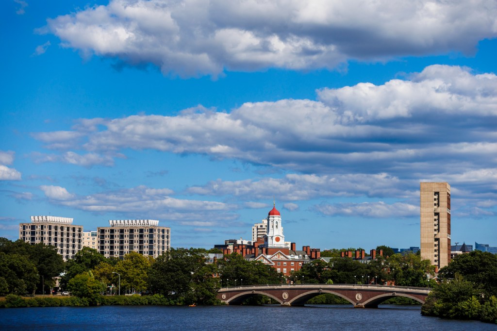 Harvard campus, blue skies and the Charles River.