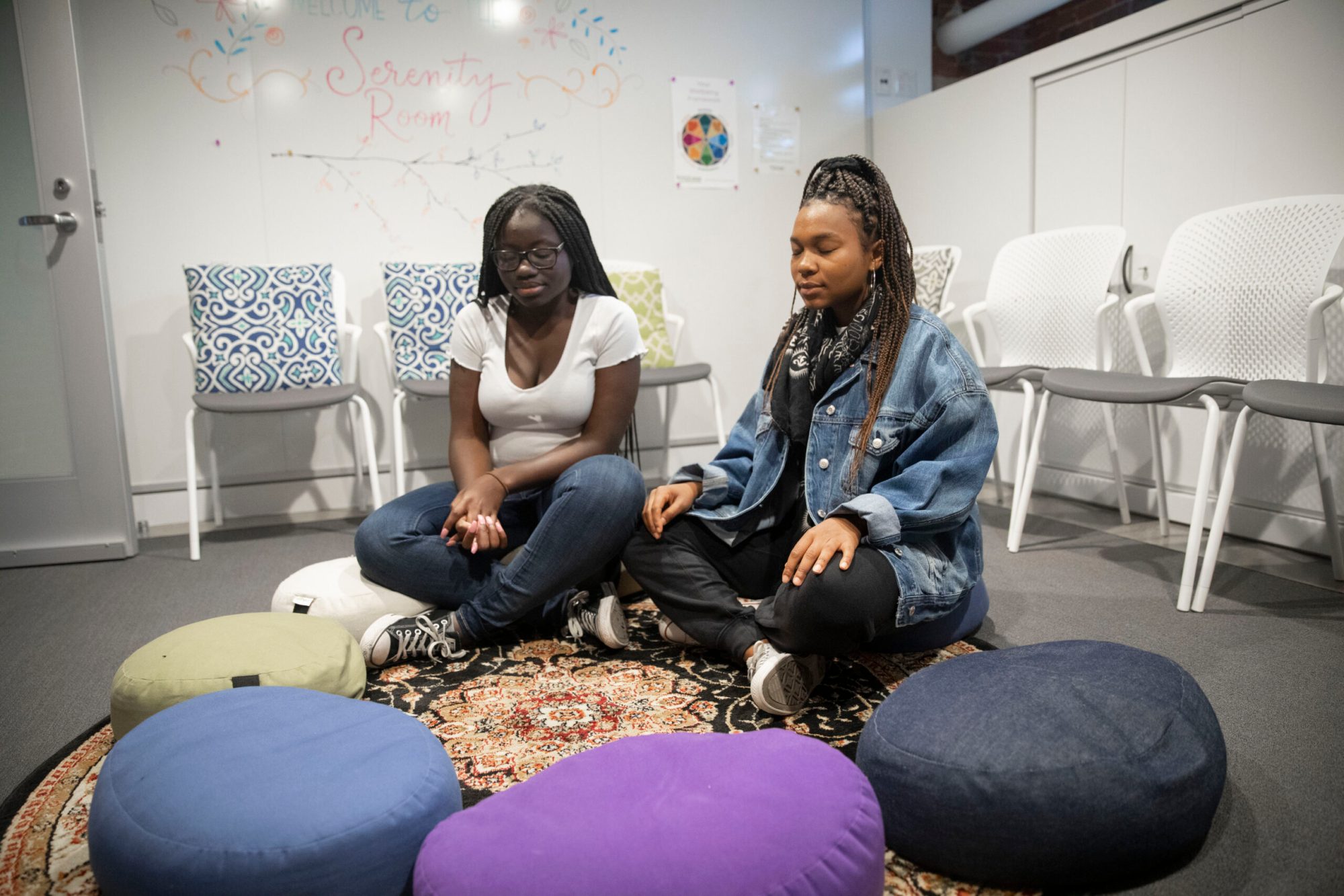 Two students meditate