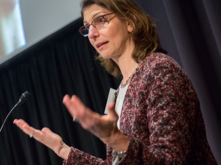 Laura Kubzansky talking at a podium
