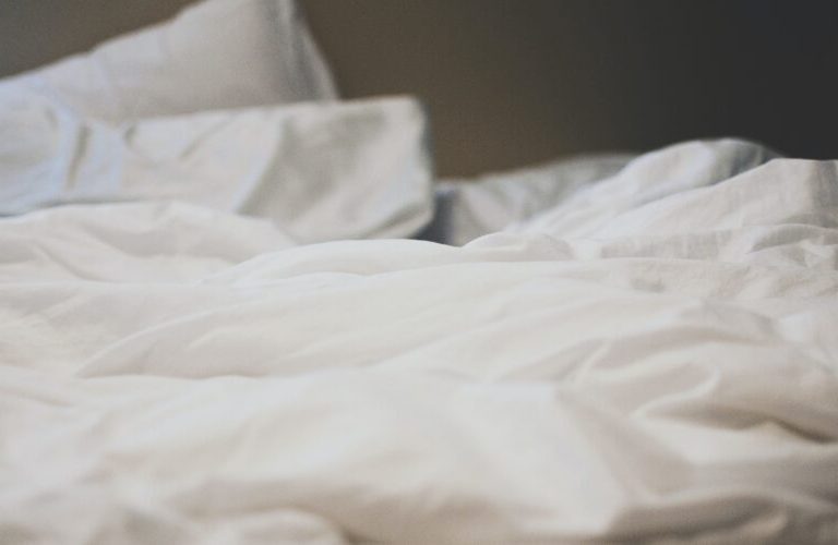 Pillows and sheets on a bed