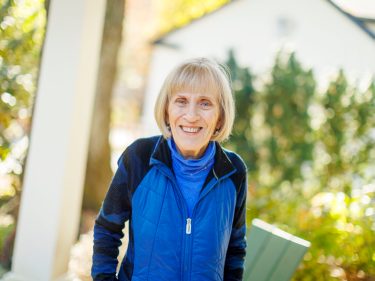Claudia Goldin standing outside