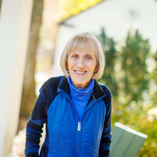 Claudia Goldin standing outside