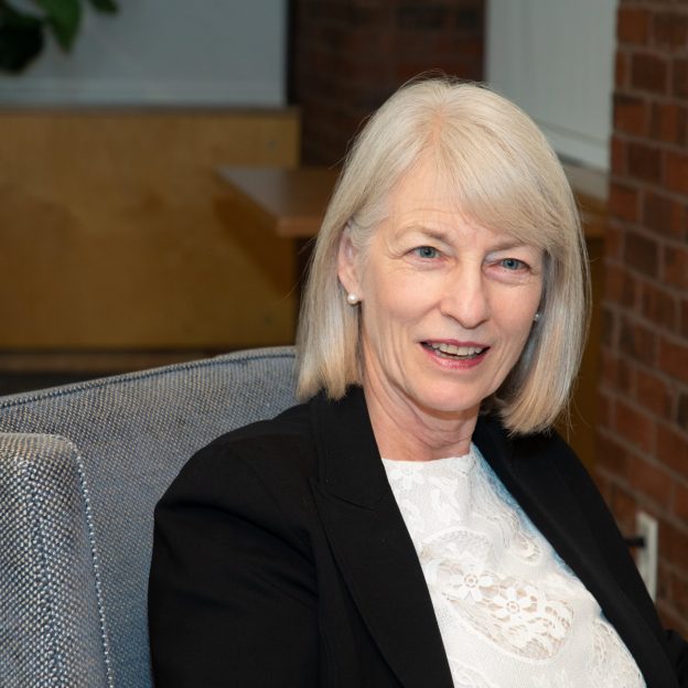 Kathryn Sikkink in a chair