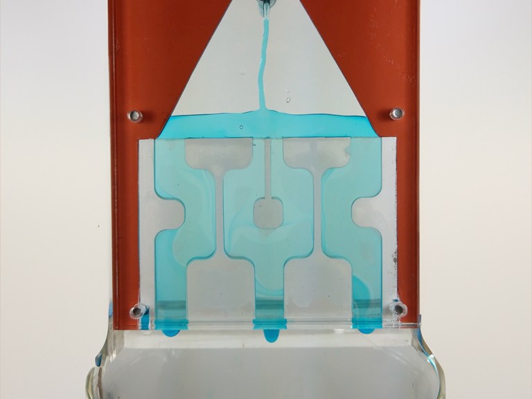 An image of the AquaPulse device