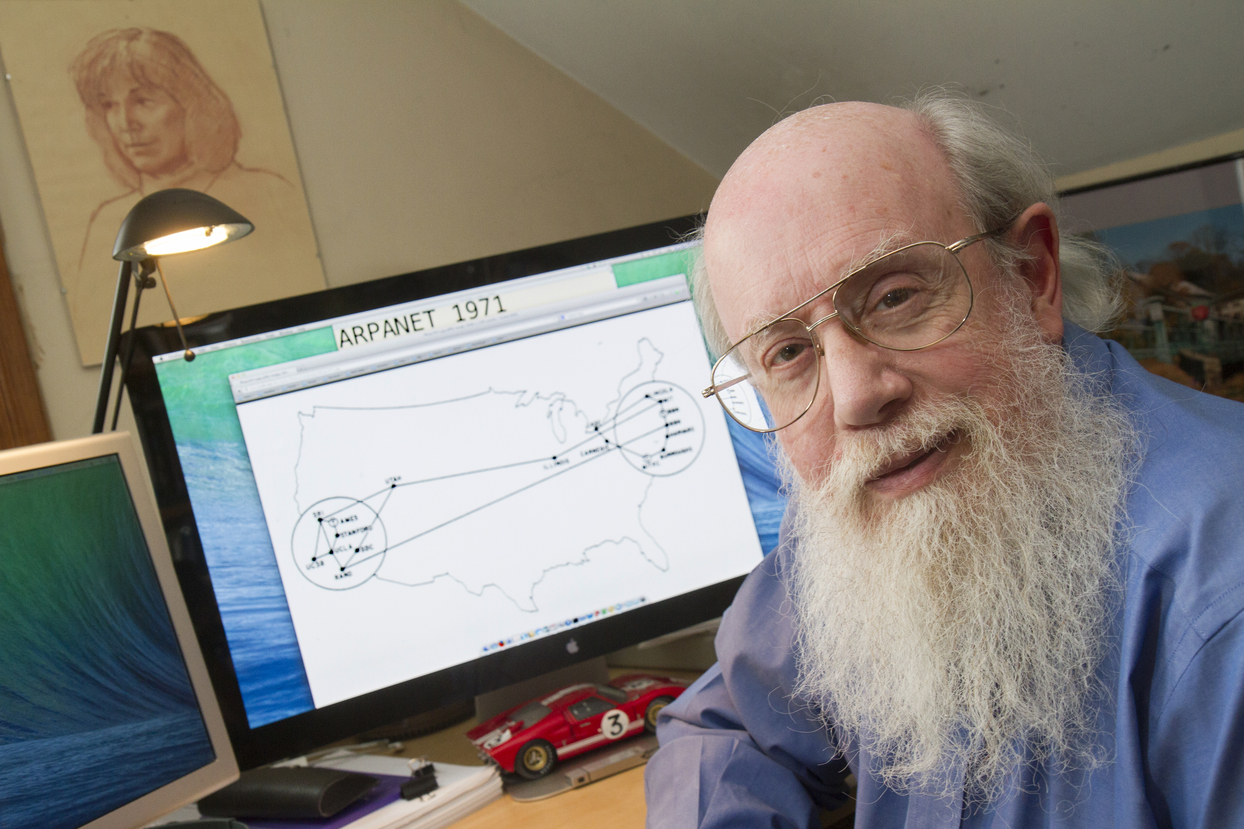 Scott Bradner holding an old motherboard