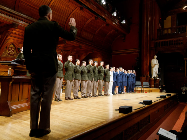 ROTC officers standing on stage