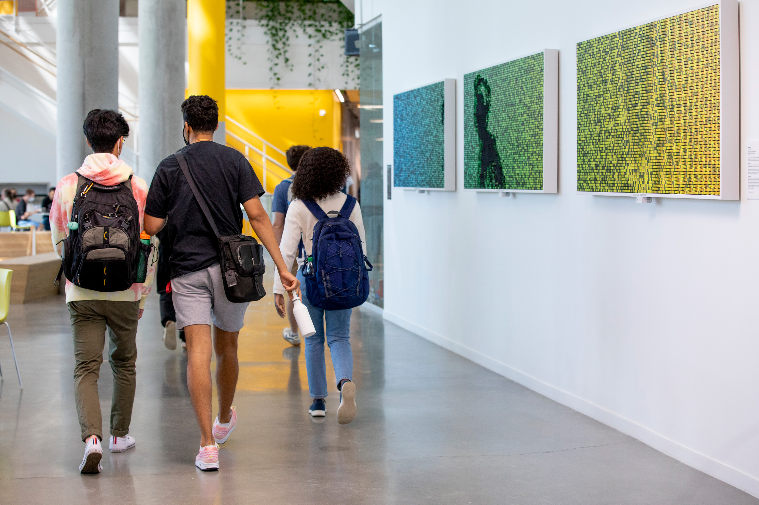 Students walking down a hall