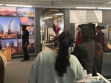 People looking at a design exhibit