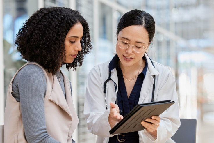 A doctor talking to a patient